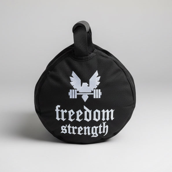 Strongman throwing bags