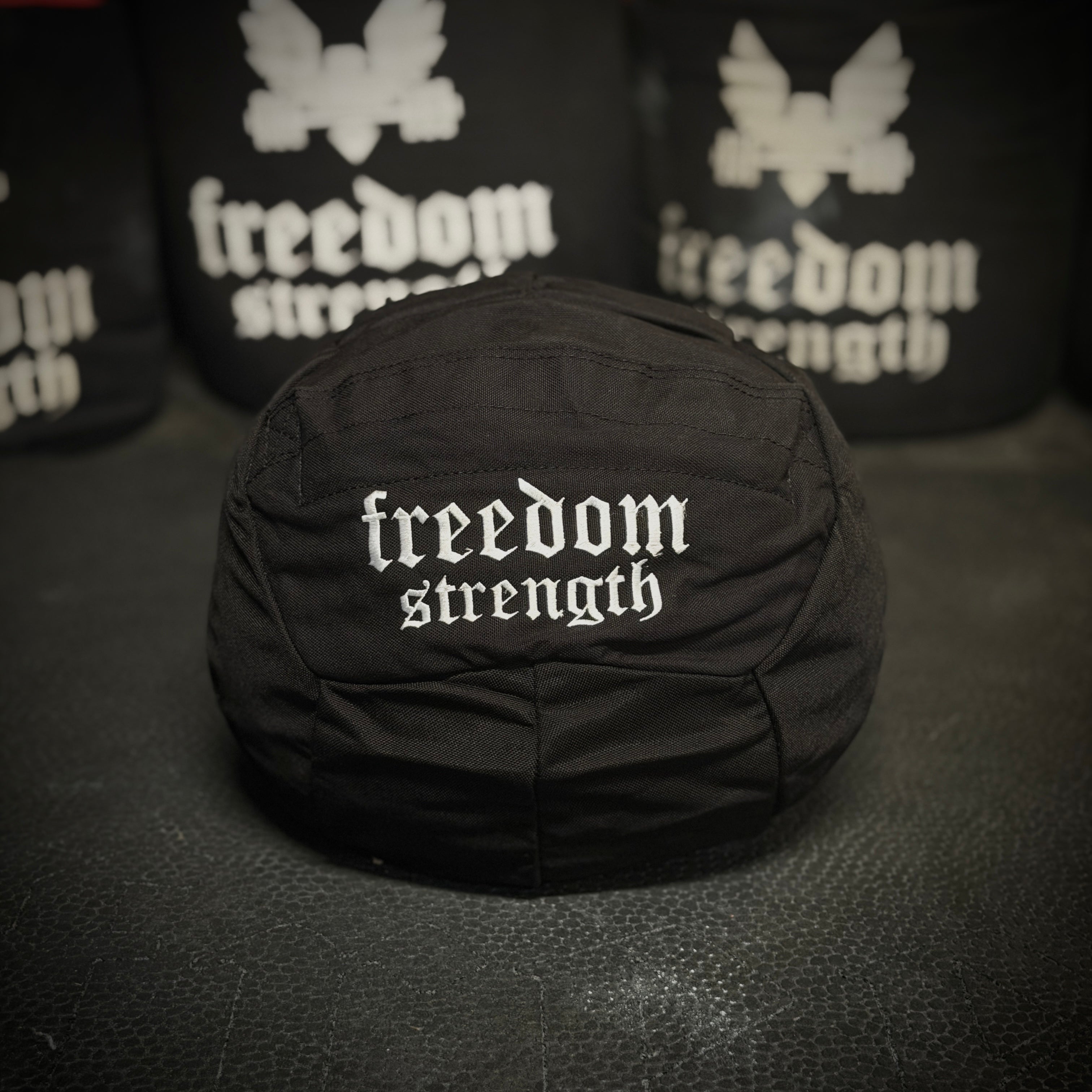 Black Atlas Sandbag with Freedom Strength embroidered on the front