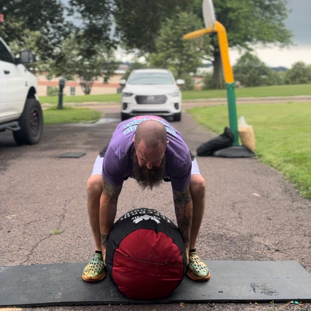 Rogue strongman sandbag discount workout