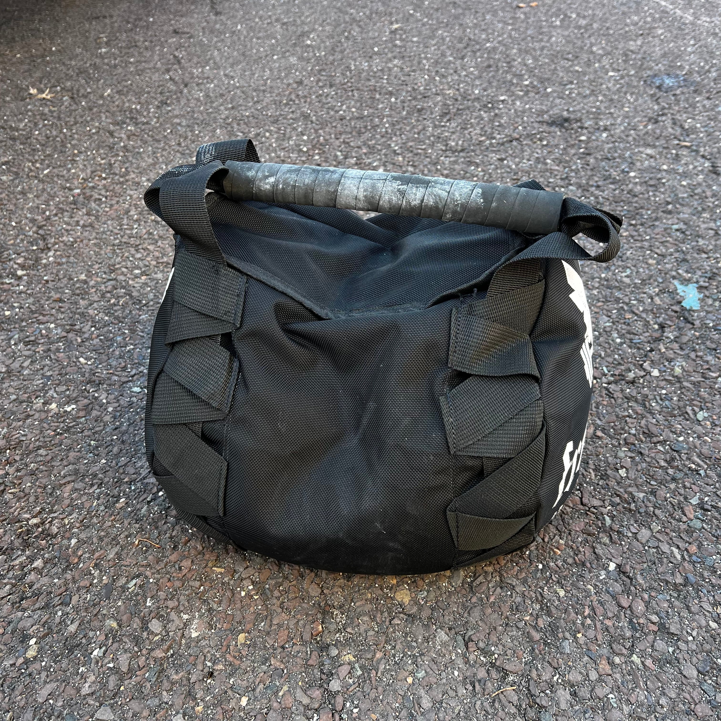 Strongman best sale throwing sandbag